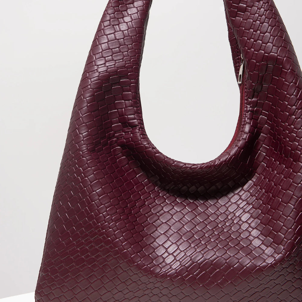 The Woven Crescent Bag