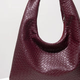 The Woven Crescent Bag